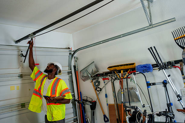 Professional Garage Door Roller Replacement technician working in Brownsville, PA